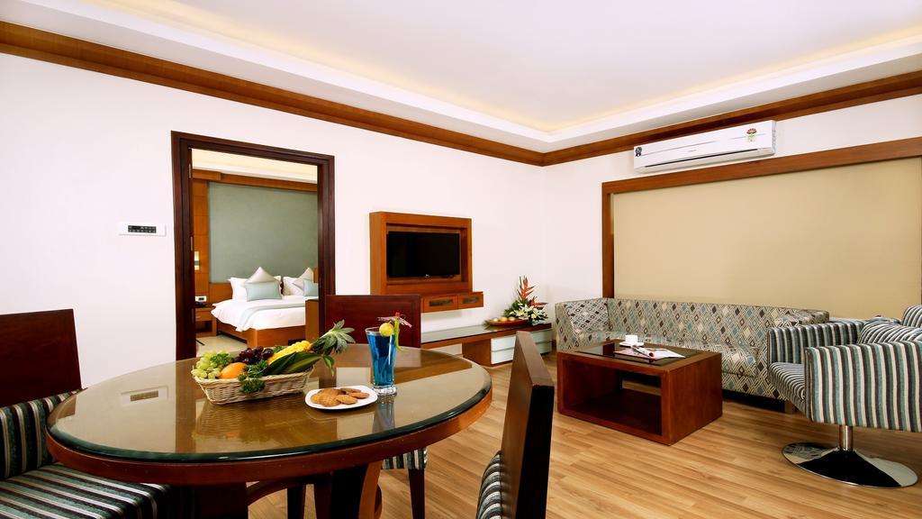 Hotel Chrysoberyl Kottayam Rum bild